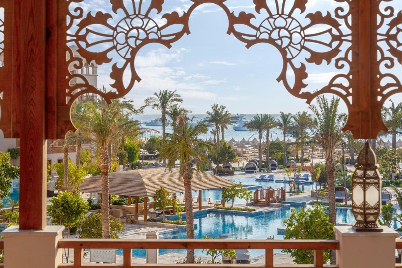 Grand Palace - Couples Only 18 Years Plus (Adults Only) フルガダ エクステリア 写真 View of the pool at the Hilton Sharm El Sheikh